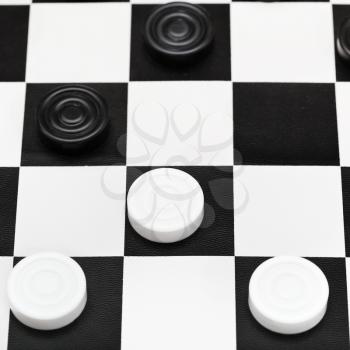 checkers game on black and white board