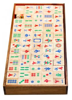 above view of set of wooden mahjong game tiles in box isolated on white background