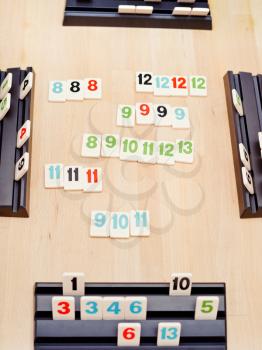 MOSCOW, RUSSIA - MARCH 17, 2014: game field of Rummikub board game. Rummikub was invented by Ephraim Hertzano in the early 1930s.