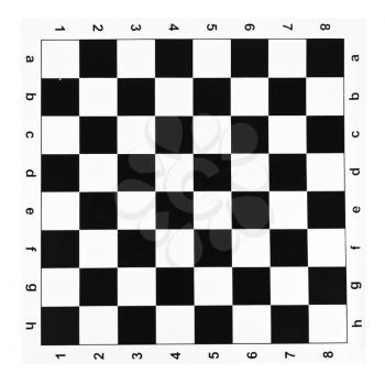 flat vinyl chessboard with black and white checks isolated on white background