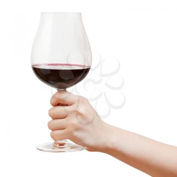 hand holds goblet glass with red wine isolated on white background