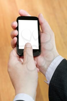 smart phone with cut out screen in businessman hands close up