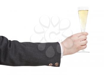 side view of champagne glass in businessman hand isolated on white background