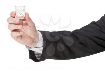 side view of vodka glass in male hand isolated on white background