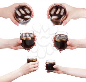 set of hand holds soft drink with ice in glass isolated on white background
