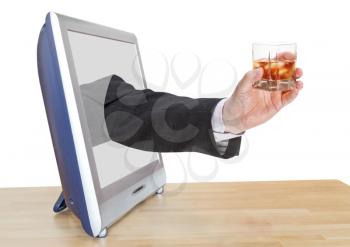 whisky with ice glass in businessman hand leans out TV screen isolated on white background
