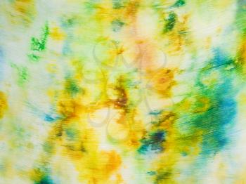 batik - abstract yellow and green painted pattern on silk fabric