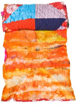 rolled silk batik and patchwork scarf isolated on white background