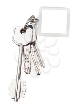 bunch of keys on steel ring and keychain isolated on white background