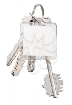 square keychain and bunch of keys on ring and isolated on white background