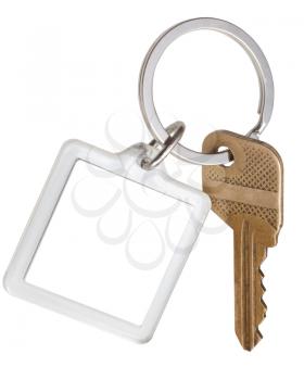 one house brass key and square keychain on ring isolated on white background