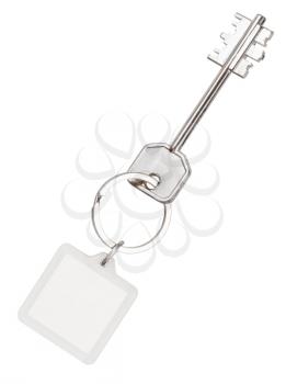 big double-sided key and square keychain on ring isolated on white background