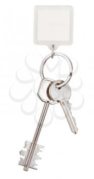 pair keys and square keychain on ring isolated on white background