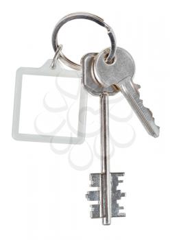 two home keys and square keychain on ring isolated on white background
