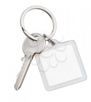 one house key and square keychain on ring isolated on white background