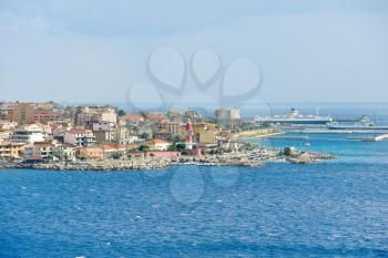 port and lighthouse in Villa San Giovanni of city Reggio di Calabria from Strait of Messina, Italy in summer day