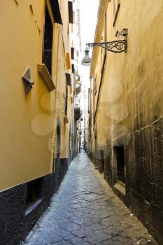 narrow street in old city of Naples, Italy