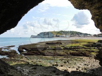 view from grotto on Etretat village on english channel cote d'albatre, France