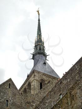 Statue of St. Michael on top of tower abbey mont saint-michel in Normandy, France