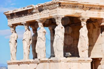 ancient sculptures of Porch of the Caryatids on Acropolis hill, Athens, Greec