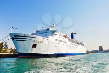 white cruise liner in port of Athens on Aegean Sea