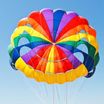 canopy of parachute for parasailing in blue sky