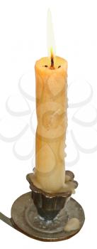 lighted candle close up in candleholder isolated on white background