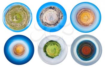 set of stylized spherical views of mountain planets