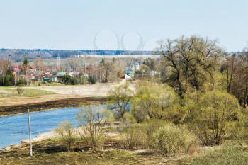 russian spring country landscape with church, village and Moskva River in Mozhaysk region