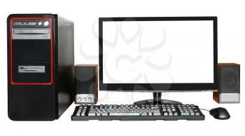 black desktop computer, widescreen display with cutout screen, keyboard, mouse, speakers isolated on white background
