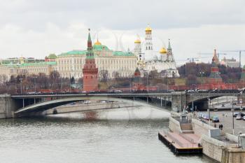 view of Bolshoy Kamenny Bridge on Moskva River and Kremlin in Moscow in autumn day