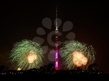 Night scenery of Moscow city with Ostankinskaya TV Tower and fireworks