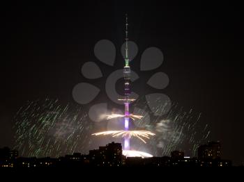 Ostankino TV Tower and fireworks in night in Moscow