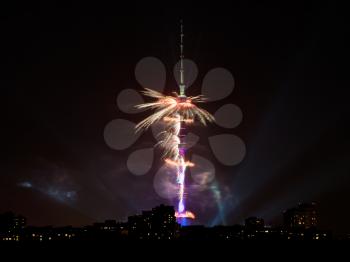 Ostankinskaya TV Tower and fireworks in night in Moscow