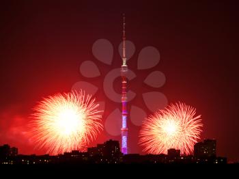 Night scene of Moscow city with Ostankino TV Tower and red firework