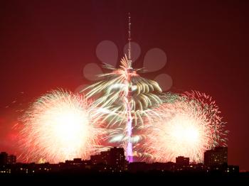 bright fireworks near Ostankino TV Tower in Moscow in night