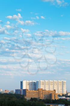 large apartment building under blue summer sky in Moscow
