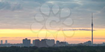 panorama of city under grey clouds at sunrise, Moscow