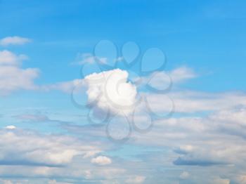 white cumulus clouds in blue sky - natural background