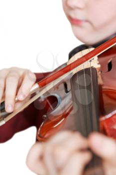 girl playing fiddle by bow close up isolated on white background