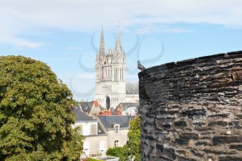Castle wall and Saint Maurice Cathedral in Angers city, France