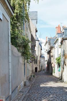 Rue Saint Aignan medieval narrow street in Angers, France