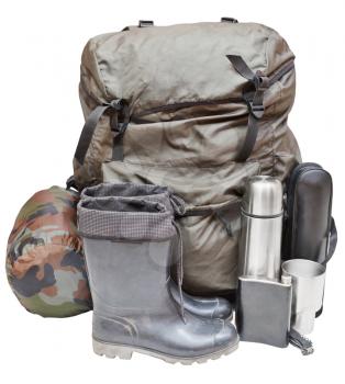 set of tourist equipment with knapsack, rubber boots, thermos, knife, flask, can, sleeping bag isolated on white background