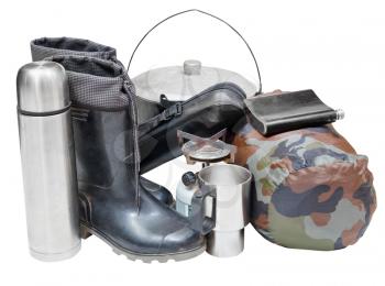set of camping belongings with gumboots, pot, thermos, flask, can, sleeping bag, gas burner isolated on white background