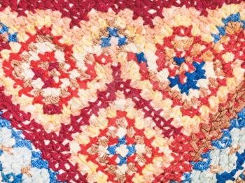 vintage knitting craftsmanship - cross stitch embroidery close up