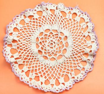 vintage knitting craftsmanship - placemat with embroidered crochet lace