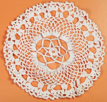vintage knitting craftsmanship - embroidered crochet lace flower ornament of placemat