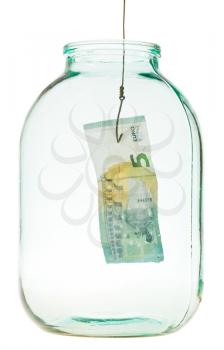 get out the last euro banknote from glass jar isolated on white background