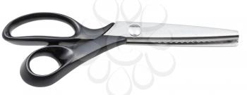 closed modern pinking shears with black handles isolated on white background