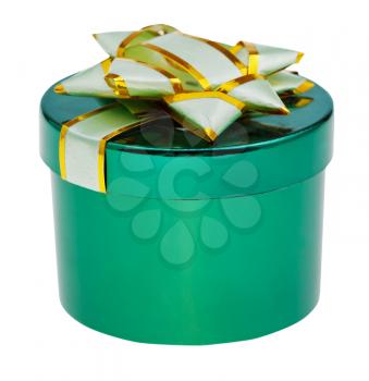 closed round green box with cover decorated by foil knot isolated on white background